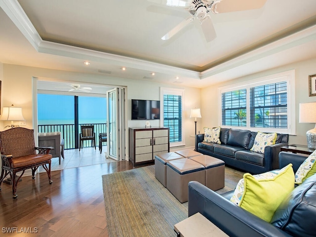1255 Gulf Shore Blvd N Unit 3N, Naples, FL 34102 - living area featuring a tray ceiling, a ceiling fan, wood finished floors, recessed lighting, and crown molding
