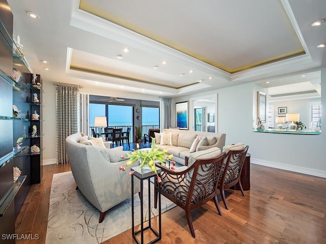 1255 Gulf Shore Blvd N Unit 3N, Naples, FL 34102 - living area with a tray ceiling, wood finished floors, plenty of natural light, crown molding, and recessed lighting