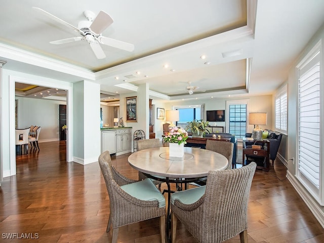 1255 Gulf Shore Blvd N Unit 3N, Naples, FL 34102 - dining space with a raised ceiling, a ceiling fan, dark wood-style floors, baseboards, and crown molding