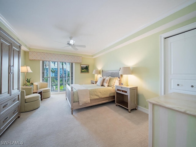 1255 Gulf Shore Blvd N Unit 3N, Naples, FL 34102 - bedroom featuring light carpet, ornamental molding, a ceiling fan, and baseboards