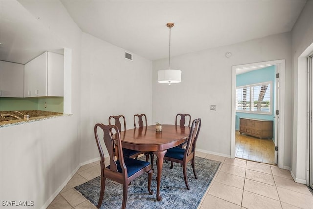 2651 Citrus Lake Dr Unit D203, Naples, FL 34109 - dining room featuring baseboards, visible vents, and light tile patterned flooring