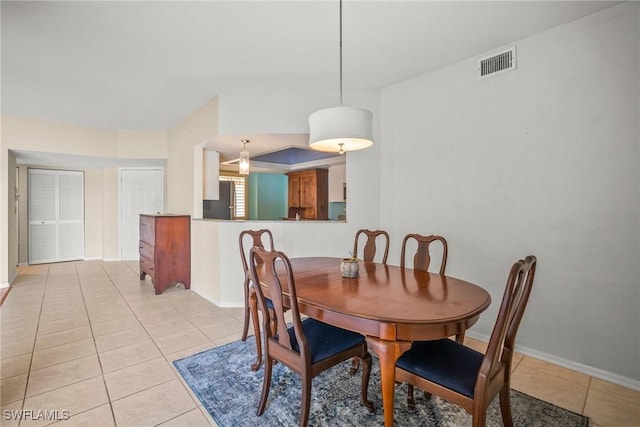 2651 Citrus Lake Dr Unit D203, Naples, FL 34109 - dining space featuring baseboards, visible vents, and light tile patterned floors
