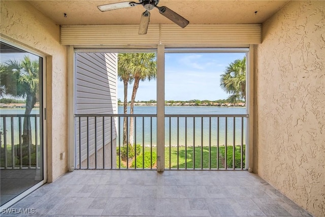2651 Citrus Lake Dr Unit D203, Naples, FL 34109 - unfurnished sunroom with plenty of natural light and a water view