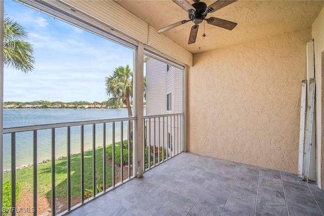 2651 Citrus Lake Dr Unit D203, Naples, FL 34109 - balcony with ceiling fan and a water view
