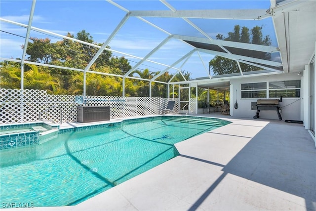 1514 Canal St, Lehigh Acres, FL 33936 - view of swimming pool with central air condition unit, a patio area, glass enclosure, and a grill