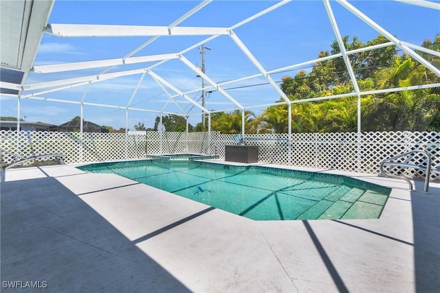 1514 Canal St, Lehigh Acres, FL 33936 - view of pool with a patio area, a lanai, and a pool with connected hot tub