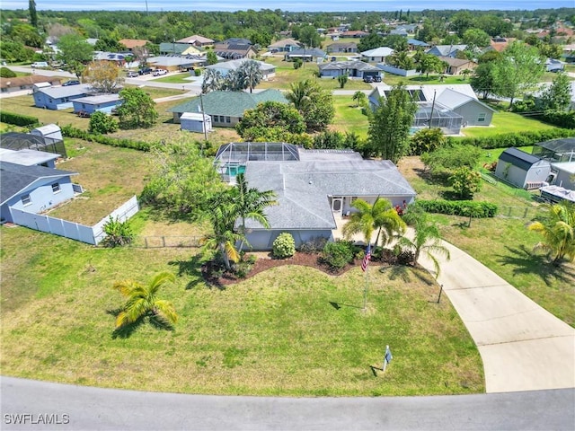 1514 Canal St, Lehigh Acres, FL 33936 - birds eye view of property featuring a residential view