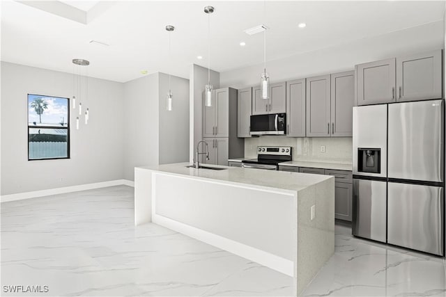 1819 NW 19th Ave, Cape Coral, FL 33993 - kitchen featuring gray cabinets, stainless steel appliances, marble finish floor, a sink, and baseboards