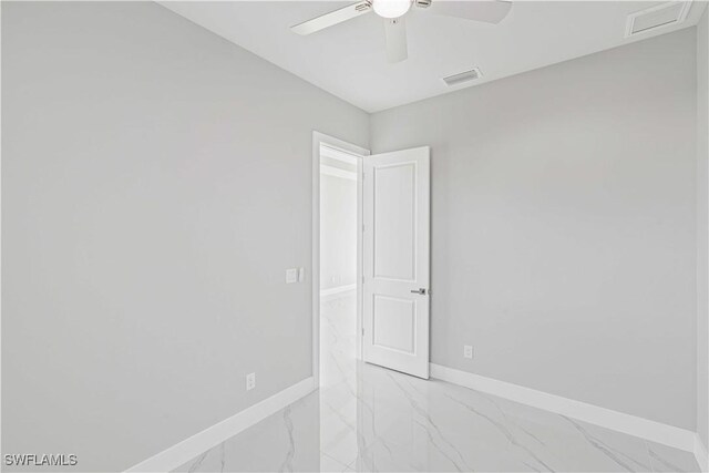 1819 NW 19th Ave, Cape Coral, FL 33993 - empty room with baseboards, visible vents, a ceiling fan, and marble finish floor
