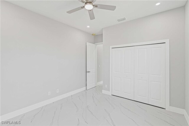 1819 NW 19th Ave, Cape Coral, FL 33993 - unfurnished bedroom featuring recessed lighting, a closet, marble finish floor, visible vents, and baseboards
