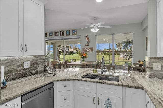 317 Sunrise Cay Unit 1-102, Naples, FL 34114 - kitchen with ceiling fan, stainless steel dishwasher, tasteful backsplash, white cabinetry, and a sink