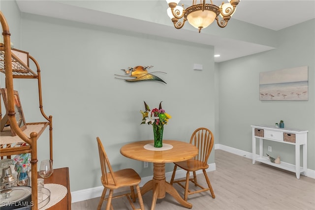 317 Sunrise Cay Unit 1-102, Naples, FL 34114 - dining area featuring a chandelier, light wood finished floors, baseboards, and recessed lighting