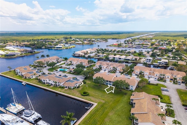 317 Sunrise Cay Unit 1-102, Naples, FL 34114 - birds eye view of property featuring a residential view and a water view