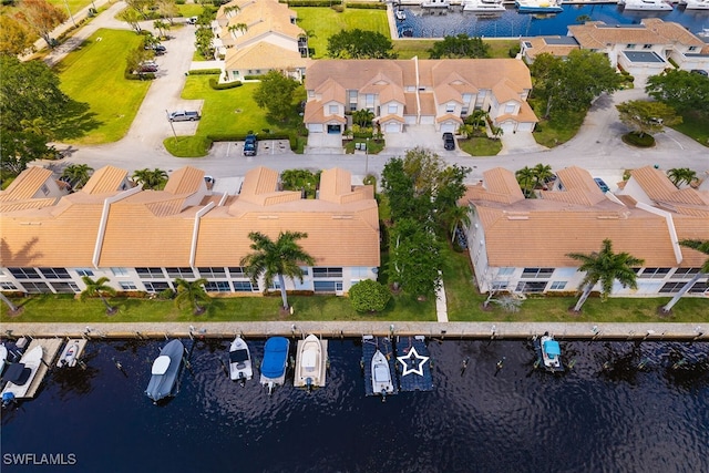 317 Sunrise Cay Unit 1-102, Naples, FL 34114 - drone / aerial view featuring a residential view and a water view