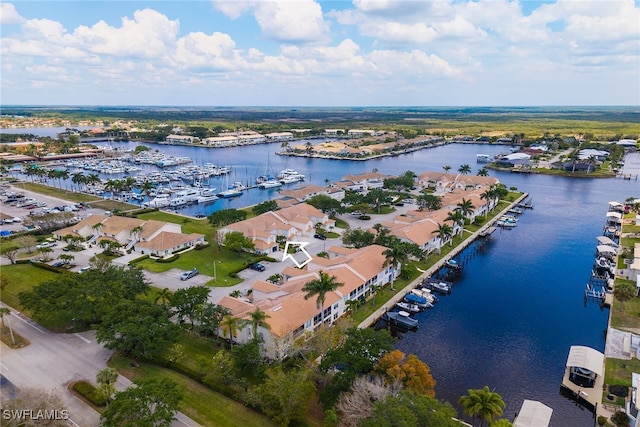 317 Sunrise Cay Unit 1-102, Naples, FL 34114 - birds eye view of property with a water view