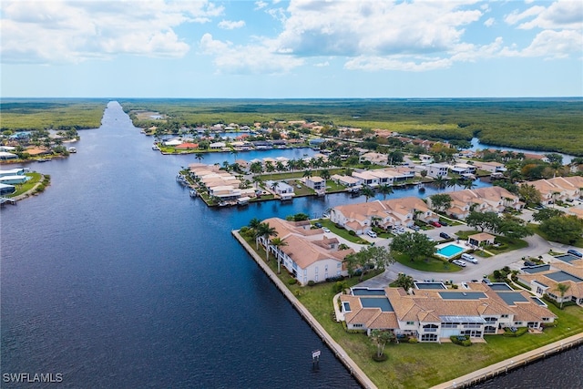 317 Sunrise Cay Unit 1-102, Naples, FL 34114 - drone / aerial view featuring a water view and a residential view