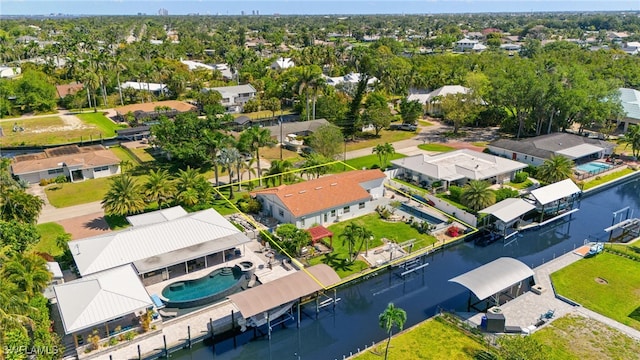aerial view with a residential view and a water view