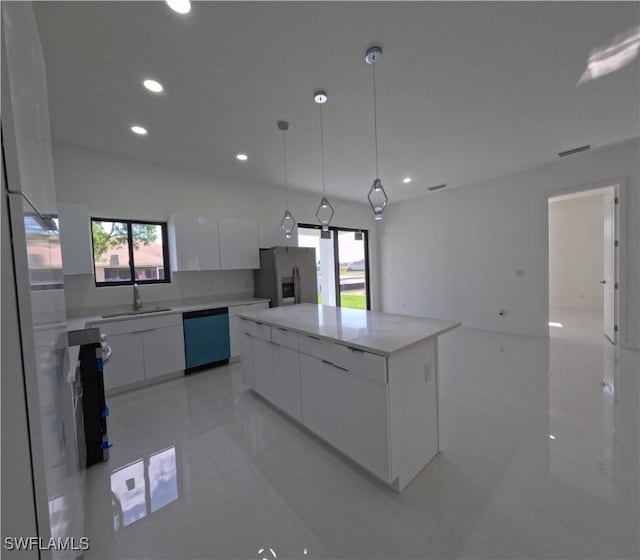 kitchen with a center island, white cabinetry, stainless steel refrigerator with ice dispenser, modern cabinets, and dishwashing machine