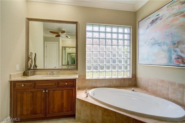 bathroom with a bath, vanity, crown molding, and a ceiling fan