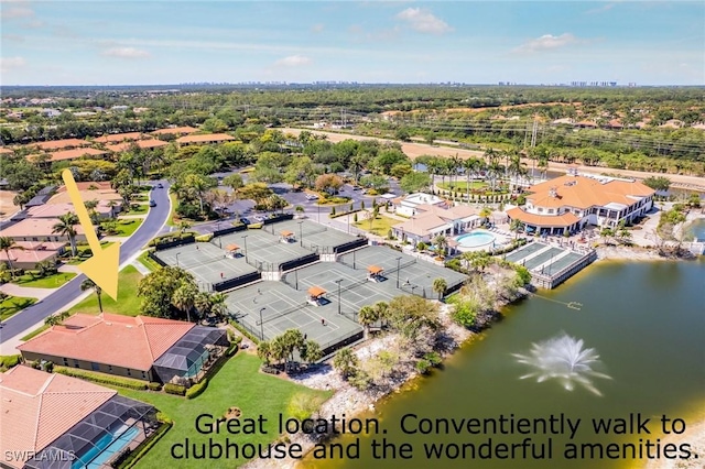 drone / aerial view with a water view