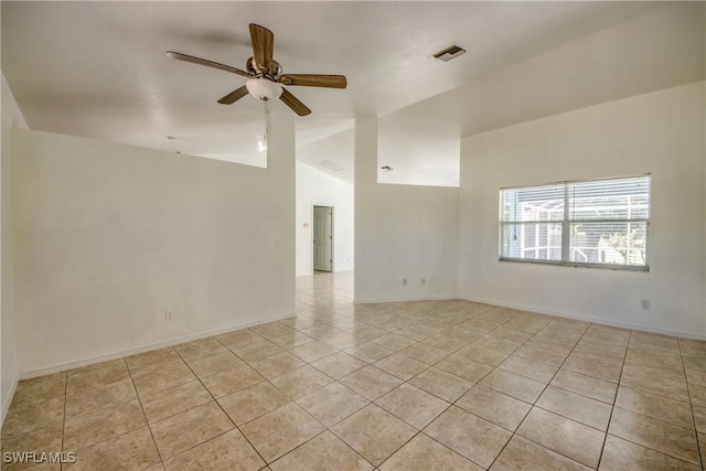 4355 SW 21st Pl, Cape Coral, FL 33914 - spare room featuring light tile patterned flooring, lofted ceiling, and a ceiling fan