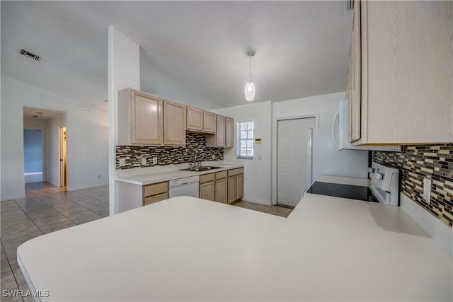 4355 SW 21st Pl, Cape Coral, FL 33914 - kitchen featuring white appliances, light brown cabinets, tasteful backsplash, light countertops, and vaulted ceiling