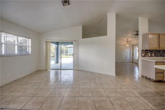 4355 SW 21st Pl, Cape Coral, FL 33914 - spare room featuring light tile patterned flooring, high vaulted ceiling, and a ceiling fan