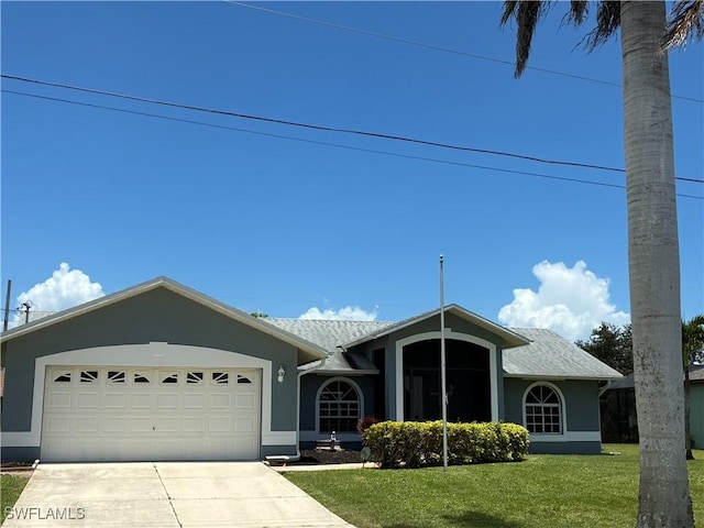 4355 SW 21st Pl, Cape Coral, FL 33914 - view of front of house with a garage, concrete driveway, a front yard, and stucco siding