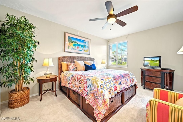 bedroom featuring carpet floors, baseboards, and a ceiling fan
