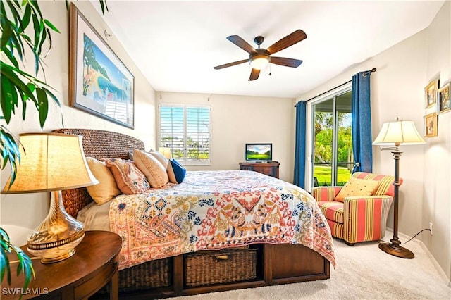 bedroom featuring multiple windows, carpet, baseboards, and ceiling fan