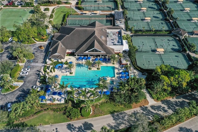 aerial overview of property's location with a pool area