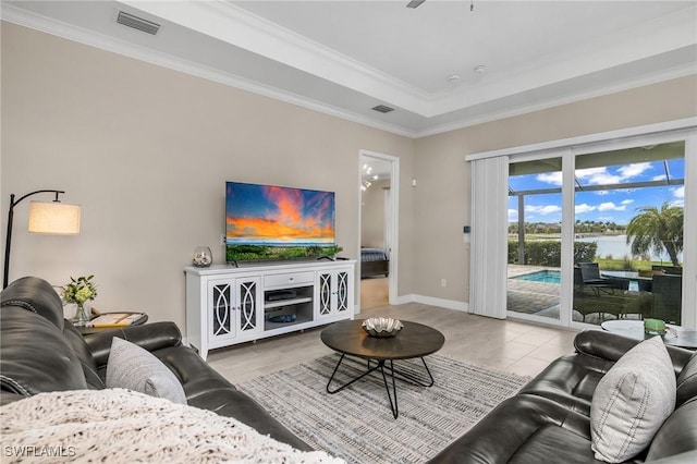 13504 Blue Bay Cir, Miromar Lakes, FL 33913 - living area with visible vents, baseboards, ornamental molding, and a ceiling fan
