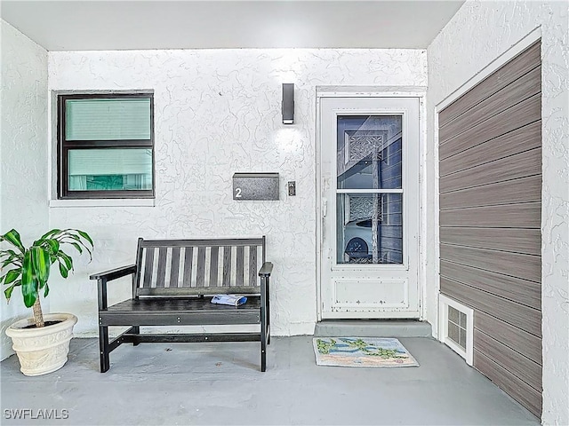1320 Blue Point Ave Unit 2, Naples, FL 34102 - view of exterior entry featuring stucco siding