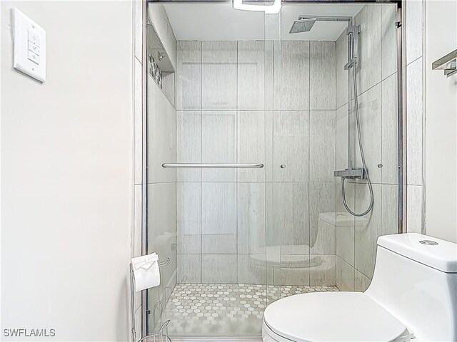 1320 Blue Point Ave Unit 2, Naples, FL 34102 - full bathroom featuring toilet and a stall shower