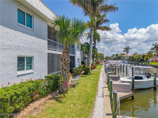1320 Blue Point Ave Unit 2, Naples, FL 34102 - dock featuring a water view and a yard