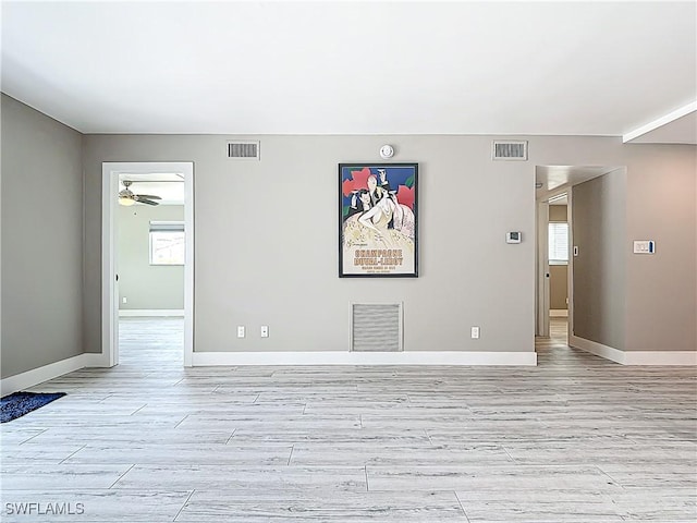 1320 Blue Point Ave Unit 2, Naples, FL 34102 - spare room with light wood finished floors, baseboards, and a ceiling fan