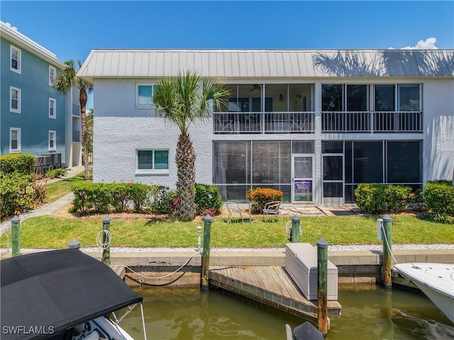 1320 Blue Point Ave Unit 2, Naples, FL 34102 - dock with a water view and a lawn