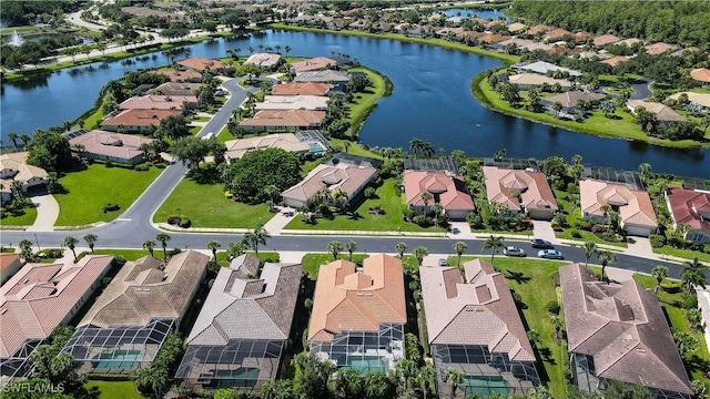 bird's eye view with a water view and a residential view