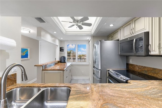 4835 Bonita Beach Rd Unit 407, Bonita Springs, FL 34135 - kitchen with baseboards, electric range, visible vents, ceiling fan, and a sink