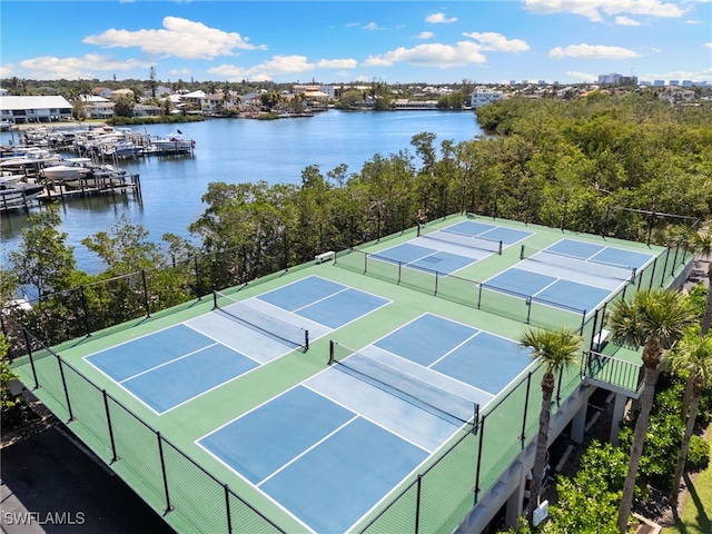 4835 Bonita Beach Rd Unit 407, Bonita Springs, FL 34135 - view of sport court with a water view and fence