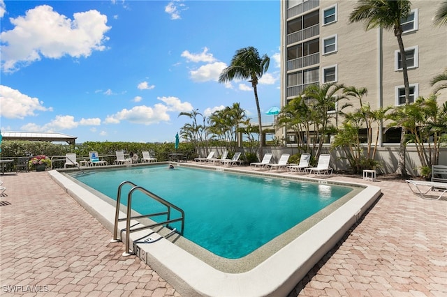 4835 Bonita Beach Rd Unit 407, Bonita Springs, FL 34135 - pool with a patio area and fence