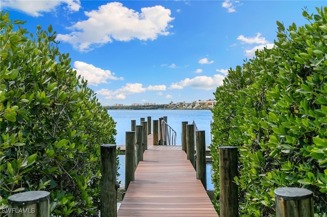 4835 Bonita Beach Rd Unit 407, Bonita Springs, FL 34135 - view of dock with a water view