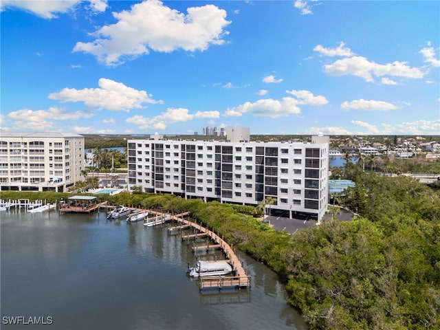 4835 Bonita Beach Rd Unit 407, Bonita Springs, FL 34135 - drone / aerial view with a water view