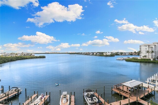4835 Bonita Beach Rd Unit 407, Bonita Springs, FL 34135 - view of dock featuring a water view and boat lift