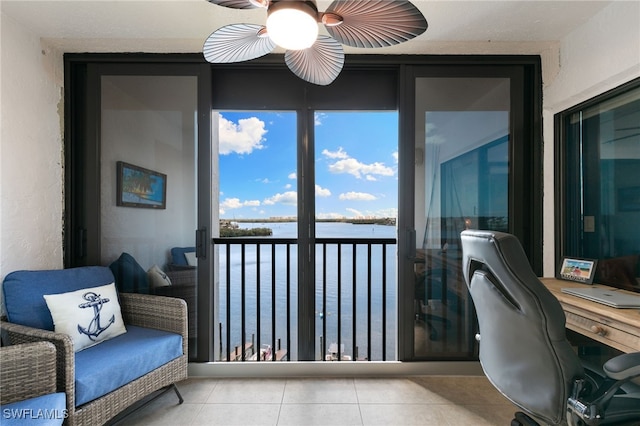 4835 Bonita Beach Rd Unit 407, Bonita Springs, FL 34135 - balcony featuring ceiling fan and a water view