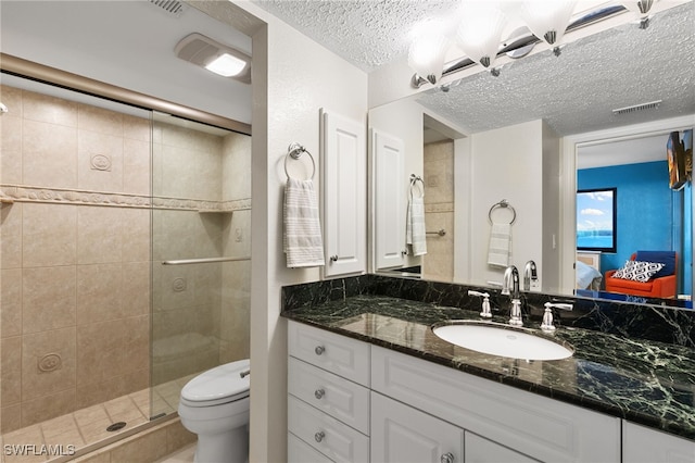 4835 Bonita Beach Rd Unit 407, Bonita Springs, FL 34135 - ensuite bathroom with visible vents, a textured ceiling, a shower stall, vanity, and ensuite bath