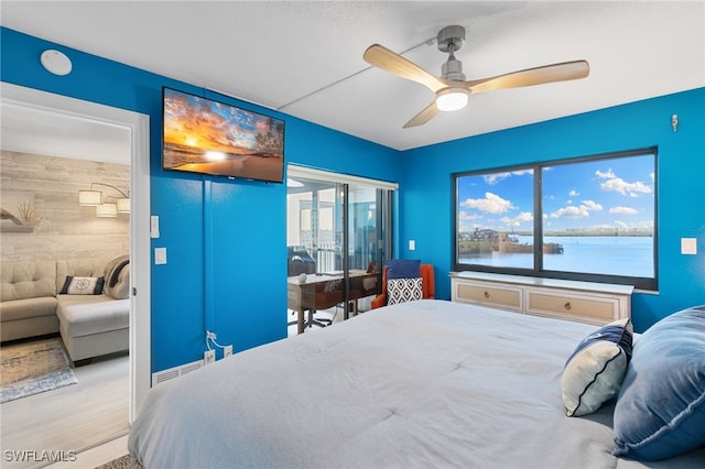 4835 Bonita Beach Rd Unit 407, Bonita Springs, FL 34135 - bedroom featuring ceiling fan and multiple windows