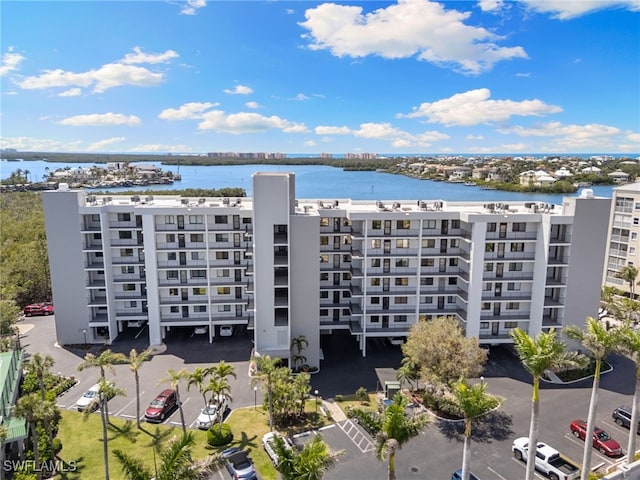 4835 Bonita Beach Rd Unit 407, Bonita Springs, FL 34135 - drone / aerial view with a water view