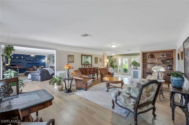 2135 SE 15th St, Cape Coral, FL 33990 - living area with light wood-style floors