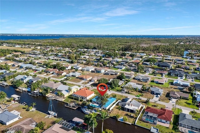 2135 SE 15th St, Cape Coral, FL 33990 - aerial perspective of suburban area featuring a nearby body of water